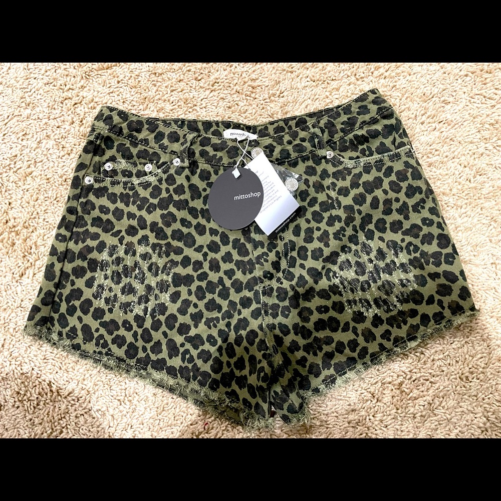 Green and black leopard print shorts